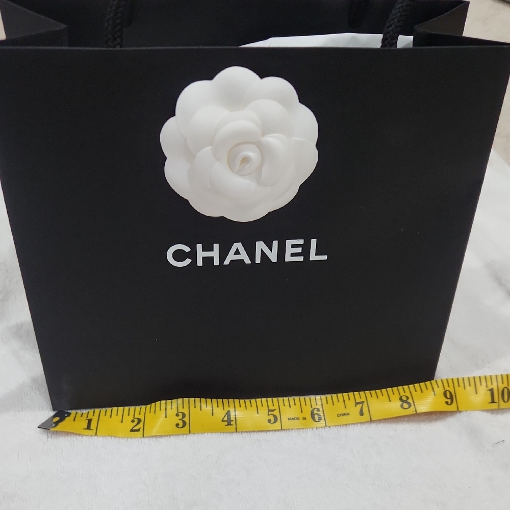 Chanel Black Bag with White Camellia